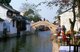 China: Bridge and canal in the ‘Water Town’ of Zhouzhuang, Jiangsu Province